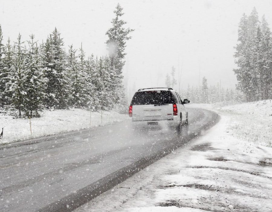 pexels-photo-12875 SUV driving on snowy forest road